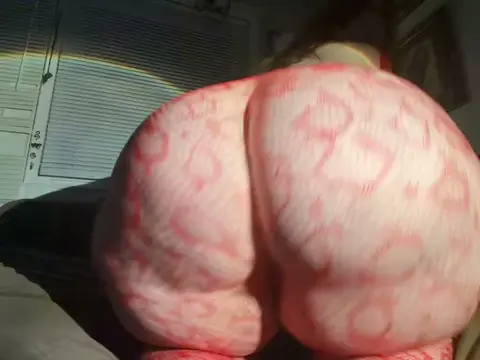 Huge Ass Redhead Shakes in Bodysuit